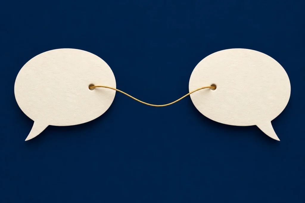 Two equal speech forms connected by a thread represent meaning carried between languages.
